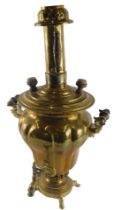 A late 19th/early 20thC continental brass samovar, with turned wooden handles and paw shaped feet, 6
