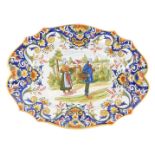 A 19thC Fourmaintraux Freres oval plaque, decorated with figures holding a basket within a foliate s