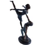 A modern blue and brown patinated bronze figure, of two ballet dancers, on oval base, 64cm high.