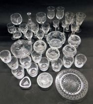 A quantity of engraved glass, to include examples decorated with flowers, a finger bowl and stand, a