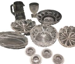 A quantity of cut glass, to include a George III rummer, on square foot, oval dishes, set of four