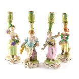 A set of four Stephenson and Hancock Derby figural candlesticks, each emblematic of seasons, depicti