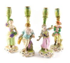 A set of four Stephenson and Hancock Derby figural candlesticks, each emblematic of seasons, depicti