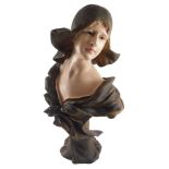 A cold painted resin Art Nouveau style bust of a lady, indistinct sculptor's name to base, 58cm high