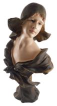 A cold painted resin Art Nouveau style bust of a lady, indistinct sculptor's name to base, 58cm high