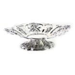 A late Victorian silver oval bonbon dish, with pierced and cast decoration of leaves, shells, etc.,