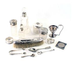 A collection of dressing table items, to include a cut glass hair tidy with silver mount, a stud box