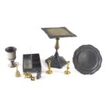 A Victorian brass and cast iron trivet, pewter plate, goblet, and desk stand, etc.