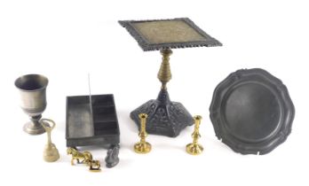 A Victorian brass and cast iron trivet, pewter plate, goblet, and desk stand, etc.