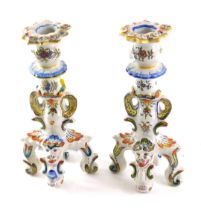 A pair of 19thC French faience candlesticks, of Desvres Griffin form, Fourmaintraux region, 24cm hig