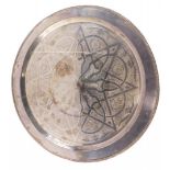 A large silver plated circular tray, engraved with a star and various other motifs, within a gadroon