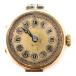 A 9ct gold cased ladies wristwatch, the circular watch head with buttoned Roman numeric outer border