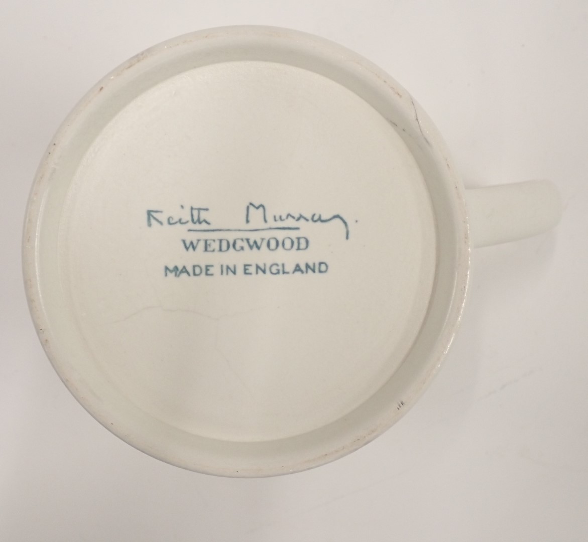 A Wedgwood cream glazed tankard or mug, designed by Keith Murray, 12cm high. - Image 2 of 2