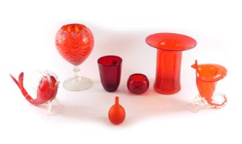 A ruby tinted art glass vase, with flared rim, 21cm diameter, a Murano fish, a red tinted goblet wit