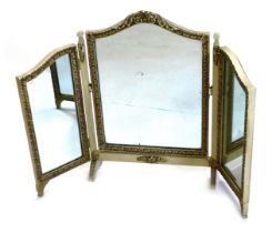 A cream painted triple dressing table mirror, with moulded borders, 61cm high, 45cm wide enclosed.