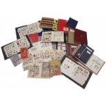 A large quantity of stamps, in albums, first day covers, etc.