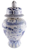 A modern Chinese blue and white vase and cover, decorated with children, leaves, scrolls, etc., 49cm