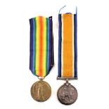 Two WWI medals, comprising civilisation medal and defence medal, each marked 31063 PTE A.E Crutchley