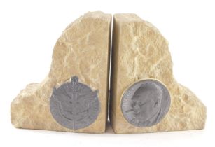 A pair of carved stone book ends, each applied with plaque for Freedom Justice and Peace, another Wi