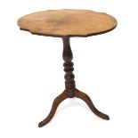 A Victorian mahogany occasional table, the shaped oval top on a turned column, tripod base, 60cm wid