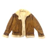 A lady's brown and cream sheepskin type jacket, no label or size.