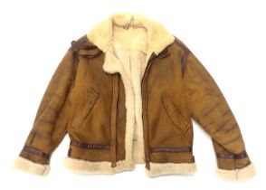 A lady's brown and cream sheepskin type jacket, no label or size.