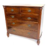 A Victorian mahogany chest of drawers, the top with a moulded edge and rounded front corners, above
