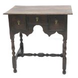 A late 17th/early 18thC and later oak lowboy, the rectangular top with a moulded edge, above three f