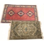 A Turkish rug, decorated with lozhenges on a pink ground, and a similar beige and blue Turkish rug,