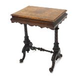 A Victorian walnut and figured walnut work table, the rectangular hinged inlaid top with a moulded e