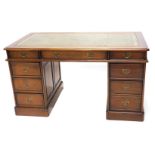 A modern hardwood pedestal desk, in 19thC style, the rectangular top with a brown leather inset and