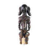 An African tribal Fang three headed reliquary figure, with rope bindings, associated metal mounting