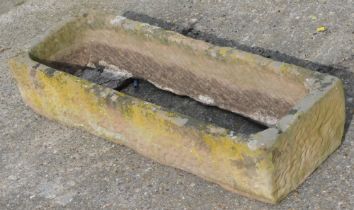 A stone trough, lacking base.