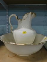 A white and gilt finish wash jug and bowl set.