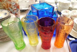 Four Marvel drinking glasses and five glass square sectional bowls.