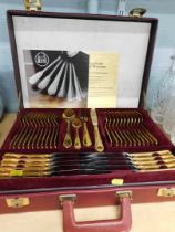 A Qualitats Bestecke cased canteen of cutlery, for eight place settings, with certificate, in 24ct g