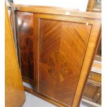 A mahogany boxwood inlaid double bed frame.