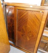 A mahogany boxwood inlaid double bed frame.