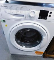 A Hotpoint 7kg washing machine.