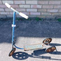 A Mobo metal toy scooter.