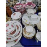 An early 20thC pink and gilt part tea service, cups and saucers, etc., unmarked.