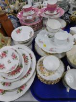 An early 20thC pink and gilt part tea service, cups and saucers, etc., unmarked.