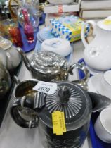 A silver plated four piece part tea and coffee service, a Carello light, pottery server and three si