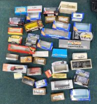 A large quantity of empty Corgi and other diecast car boxes. (1 bag)