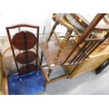 A mahogany side table, with barley twist columns, three side chairs, and a three tier plant stand. (