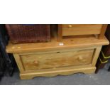 A pine storage chest with single drawer, on bracket feet.