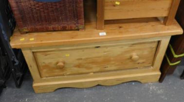A pine storage chest with single drawer, on bracket feet.