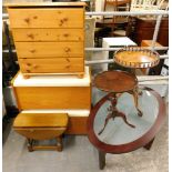 A pine chest of drawers, two hardwood and cream cushioned storage chests, oval coffee table, reprodu