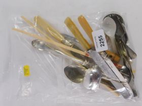 A continental fork, white metal stamped 800, various bone handled cutlery, and a set of chopsticks.