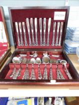 An Onedia six place setting cased canteen of stainless steel cutlery.